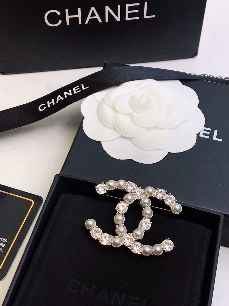 Ch**el brooches